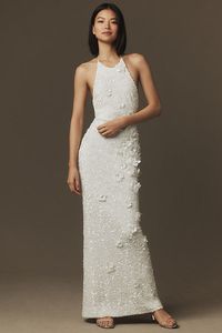 The Helsi Brice Halter Sequin Column Maxi Dress dazzles with its glimmering sequins and sleek halter neckline, creating a strikingly romantic and elegant silhouette. | Brice Halter Sequin Column Maxi Dress by Helsi in White, Women's, Size: Largearge, Polyester/Elastane at Anthropologie