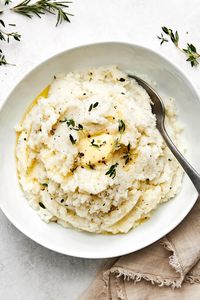 This mashed cauliflower is a fabulous low-carb side dish for weeknight dinners. It's delicious, creamy, flavorful, and quick to make!