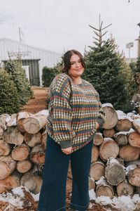 Stay cozy and warm in this PLUS SIZE Feels Like Fall Sweater! Knit in a stunning multicolor design, this sweater is finished with banded cuffs, neckline, and hemline, adding a fun touch. Perfect for any cool day!  Details Knit material Drop shoulder Round neckline Banded neckline, cuffs, and hemline Long sleeve Sizing *Measurements are taken unstretched with item hanging* Approximate measurements: SIZE LENGTH BUST 1XL 32” 52” 2XL 32” 54” 3XL 32” 56” Fabric has stretch Model is 5’7” wearing 2XL Material 53% Acrylic 18% Polyester 18% Nylon 10% Wool 1% SpandexTurn inside out Hand wash cold with like colors Do not bleachReshape, lay flat to dryCool iron if needed