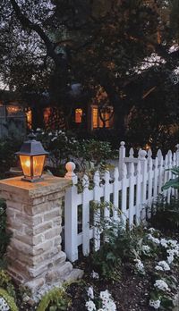 Discover creative ways to adorn this classic feature with vibrant blooms, lush greenery, and decorative elements, creating a welcoming and idyllic atmosphere that your neighbors will envy. Explore the possibilities and let your front yard bloom with beauty and nostalgia. #FrontYardLandscaping #WhitePicketFenceIdeas #CurbAppeal #GardenDesign #LandscapeInspiration #ClassicCharm #HomeExterior #FrontYardGardening #VintageGarden #OutdoorDecor #GardenGoals