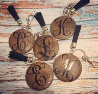 Wood disc keychains with black tassel. Monogrammed with 651 vinyl