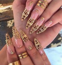 The best elegant gold nails acrylic almond, gold nails with rhinestones, gold French tip nails for an Indian wedding, beautiful gold nail ideas glitter, gold nail art designs classy and more! These include gold nails almond, gold foil nails acrylics long, general long gold nails, gold nail art acrylics and gold nails with glitter! These are great for all seasons and especially great for the holiday season. #goldnails #golanailideas #goldnailsacrylic #goldnailart #goldnaildesigns #frenchtipnails