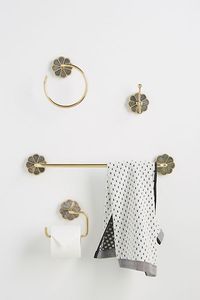 Flower bathroom towel rod set. Love this unique and beautiful way to hang up your towel, toilet paper roll, and washcloth. Simple, pretty, minimalist, detailed. #affiliate #gold #anthropologie #organize #ideas #wall #bathroom