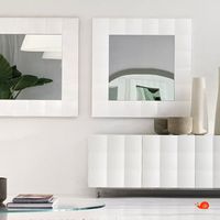 The Venice mirror by Tonin Casa, with its refined design, enhances any space with elegance. Part of a sideboard collection, it’s perfect for those seeking a unique, contemporary style.