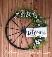 Excited to share this item from my #etsy shop: Wagon Wheel Farmhouse Welcome Wreath, Modern Farmhouse, Hand Painted Wood Sign, Metal Wreath, Spring/Summer Door Decor, Wall Decor, Wedding