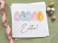 Happy Easter egg watercolour greetings card Send someone happy Easter wishes with this cute card. Printed from my original watercolour painting, it features a row of pastel coloured speckled Easter eggs, printed on high quality textured matte 300gsm card. The detail in the printing makes it look just like my original painting! The card is blank inside for your own message. The size is 150mm square, and is supplied with a plain white envelope.  Many thanks for looking! © Heather Trefusis 2020