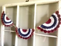 These crochet flag buntings are perfect for decorating for the Fourth of July, Labor Day or Memorial Day or keep up year round to show your American pride!  Each flag measures approximately 10" x 5" and the length is about 40". These can be lengthened or can have more flags added, just message me before placing your order.  Because all items are handmade by me, no two items will be just alike.  The item you receive may vary slightly from the listing photos.  Please feel free to message me with an questions you may have! *Pattern by Country Life in Crochet*