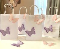 Butterfly Favor bags pink and lavender, butterflies with gemstones, elegant butterfly gift bags, goodies, birthday party decor, baby shower, wedding, butterfly fairy bags.  🦋Please leave the date of your event in the "add a note to AngelGiftBoutique" when checkout 🦋 Made to order beautiful and unique favor goodie bags with premium paper card stock butterflies embellished with gemstones.  These bags are so adorable that your guests will be super delighted to receive them 🦋 If you need more the