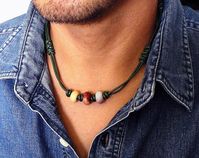 "This is a tribal-inspired choker necklace for men or unisex handcrafted in my studio. It is made with a genuine leather cord in green, which I hand-knotted and braided with a special technique, and accentuated with natural gemstones. This casual leather necklace closes with an antiqued finish brass hook clasp. Please select from the stone color options. Option A: Mookaite Jasper and Indian Agate Option B: Picture Jasper, Rainbow Jasper, Indian Agate Option C: Indian Agate and Rainbow Jasper Len