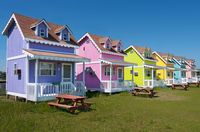 Unusual, colorful, tiny cottages not far from the beach in the town of Hatteras. Reminded me of a John Mellencamp song, here's a YouTube link for your listen pleasure: Little Pink Houses   See this image on a dark background with Fluidr