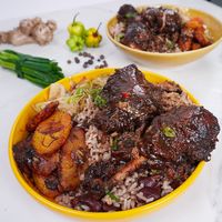 Try this delicious Jamaican Brown Stew Chicken—slow-cooked chicken in a savory sauce with a mix of spices and aromatic ingredients.