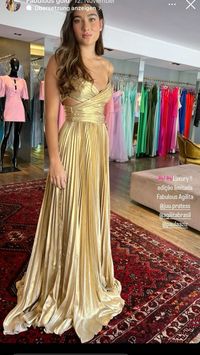 Turn heads with this breathtaking gold evening dress, designed for those unforgettable moments. With a sleek silhouette, bold slit, and shimmering details, this gown is your ticket to ultimate glam. Perfect for prom, galas, or weddings. ✨ #GoldGown #EveningGlam #PromQueenVibes #LuxuryStyle #FormalFashion #ShineInGold #ElegantStyle #SpecialOccasionWear #GlamorousNights #goddesscomplex