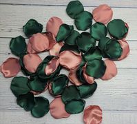 "Your Rose Petal Set will include stunning Emerald Green and Dusty Rose satin petals. You have the choice to add Gold or Ivory rose petals to your set. Our gorgeous flower girl rose petals are perfect for tossing, scattering or used as aisle decorations. Is your Wedding Decor in a Classic, Boho Chic or Forest Woodland Theme? We offer many styles and color combinations that you can customize by adding additional colors or omitting a color/s. This allows you to create a Perfect set that is unique