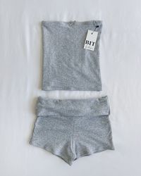 * All preorders for this item ship within 1-2 weeks! Soft and stretchy gray tube top and matching fold over shorts Sustainably handmade with deadstock cotton fabric Slightly cropped fit and fully hemmed Shorts and front part of top are double layered and not see through Model is wearing a size S Free U.S. shipping!