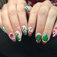 These nails celebrate the holiday season with a colorful Whoville theme, complete with Grinch details, Christmas lights, and festive ornaments. The bright designs bring an extra touch of joy to your holiday look.