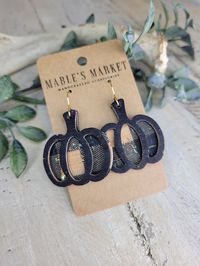 "Adorable fall pumpkin earrings made with leather backed cork. Great for any occasion and could be dressed up or worn casually! They would also make a great gift!  *cork pattern may vary slightly from the photos due to the uniqueness of the pattern. Pattern is only on the front side of the earrings. Drop measures 1.5\" long and 1.75\" wide at the widest point. Full earring length measures 2\" long."