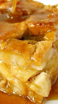 Drunken Apple Bread Pudding ~The top is a little crisp, inside is moist with a soft but firm-ish texture, the bread cubes soaking up all the custard-y goodness that only cinnamon and rum can bring . Drizzled and smothered in sticky, gooey, sweet, highly addictive BUTTERSCOTCH RUM SAUCE