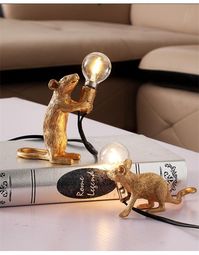 With its adorable design and warm golden glow, this lamp is sure to light up your life. Don't let its size fool you - these mice may be mini, but their charm is mighty. Get yours today and let the cuteness take over! Material: Resin Size: Approx. 6" L Care: Dust regularly. Imported