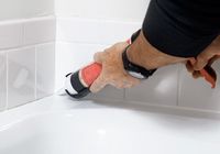 HomeZada | Inspect caulking in bathrooms