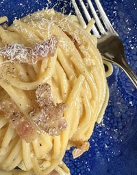 Pasta carbonara is an egg based pasta dish from Italy. The authentic recipe never includes cream and uses guanciale.