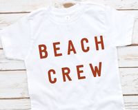 Beach Crew T-shirts for your family vacation. This is a minimalist cute design that will make your vacation and beach picture stand out and your kid will love them!  Match with smaller siblings, TODDLER SIZES HERE: https://www.etsy.com/listing/1234476968/minimalist-beach-t-shirt-toddler-beach?click_key=07a71bfbed85b65a7fc532ad63356503375388b0%3A1234476968&click_sum=1e9625ea&ref=shop_home_active_18 Similar Design available here: https://www.etsy.com/listing/1256014413/minimalist-beach-t-shirt-kid