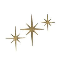 This trio of 8 pointed compass stars adds a wonderful Mid-Century modern touch to your indoor or outdoor decor. Crafted of cast iron, the stars feature an antiqued metallic gold enamel finish to give them a great aged look. Hang them together or separately for a perfect accent to the vintage, beach, or nautical-themed rooms. Everly Quinn | Everly Quinn 3 Piece Cast Iron Starburst Star Wall Décor Set 12.0 H x 8.75 W x 0.25 D in brown / gray / white / yellowMetal in Gold | 12" H X 8.75" W | Wayfai