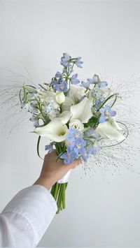 White & blue bridal bouquet Check more at https://beautyfashionideas.com/bridal/white-blue-bridal-bouquet-2/