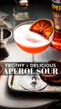 With its bright, citrusy flavor and enticing foamy top, this Aperol Sour is a light and refreshing cocktail you'll love! Ready in 5 minutes. // cocktail recipes