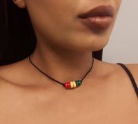 Rasta Necklace - Rasta Choker - Ethiopian Choker - Ethiopian Jewelry - Rasta Jewelry - African Choker - African Jewelry  * D E T A I L S * This Choker is made with Wooden Rondelle Beads and is strung onto Black Nylon Cord that has a lobster clasp closure.  * S I Z E * This necklace is available in the following sizes: 11 inches 11.5 inches 12 inches 12.5 inches 13 inches 13.5 inches 14 inches  Each necklace has a 2'' extender chain.  * Q U E S T I O N S *  If you have any questions, feel free to