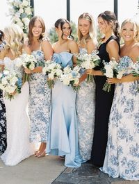 Looking for mismatched blue bridesmaid dresses? This bridal party teaches us how its done by seamlessly mixing shades of blue as different patterns! Head to the Style Me Pretty gallery for even more inspo.Photography: Erin Wilson Photography (http://erinwilsonphotography.com)