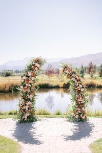 Blush rose, blush spray rose, cafe au lait dahlia, bronze dahlia, coral hanging amaranthus, chocolate lisianthus, cappuccino rose, white delphinium, bronze fern, bronze amaranthus, lysimachia