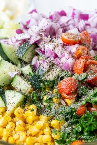 Bright and colorful cucumber, red onion, sweet corn, cherry tomatoes, and feta cheese make up this refreshing corn salad. Perfect for backyard barbecues and cookouts and is made in a snap!