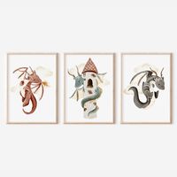 "This set of 3 dragon nursery prints are perfect for any dragon theme room. These watercolor prints feature a red fire breathing dragon flying in the clouds, a dragon wrapped around a castle tower, and an adorable black dragon flying in the clouds. Display this printable dragon wall art in a dragon boy room, dragon playroom, or a dragon girl room. Three very cute dragon posters that will bring you and your little one happiness, magical storytelling, and bright imagination. Bring a dragon fantasy