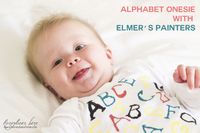 Create your own alphabet onesie using Elmer's Painters paint markers. Easy #DIY gift or activity for a baby shower!