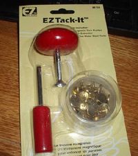 If you're relatively serious about embroidery, you probably have a good selection of favorite tools on hand - those things beyond needle, scissors, and hoop. Here's one of my favorite tool investments - and it doesn't cost much! The EZ Tack-It kit is quite handy to have - so much so, that I have