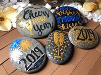 Each rock is hand painted with acrylic paint and has accents of glitter and/or flakes of gold. Sealed with a high gloss varnish for indoor/outdoor decor. *Select from the drop down list, style name of each stone is listed in photos Cheers To A New Year - approximately