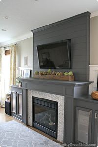 gray painted fireplace @thriftydecorchick..without a tv