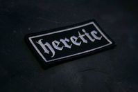 Simple, classic and true. Heretic patch is 3 inch wide, with iron on backing and merrowed borders. Ships worldwide! © + ℗ 2020 Torvenius Illustration AB