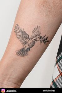 This small tattoo depicts a dove carrying a small olive branch in its beak. These symbols carry a deep meaning of peace and hope, dating back to the time of Noah’s Ark. When the rains subsided, Noah sent out a dove to search for dry land, and it returned with an olive branch. Since then, this imagery has symbolized the promise of something beautiful awaiting us beyond every storm, offering a message of enduring hope.