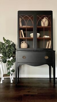 "THIS ITEM HAS SOLD! This is an example only! Please do not purchase. This beautiful rustic cabinet comes with a skeleton key, and has its original hardware. It was hand painted in 'Coal Black' and has been distressed throughout. It has a matte/chalk like finish, and is completely sealed for protection. It has a lockable glass door with two wooden shelves behind, and one dovetail drawer for a lot of storage space.   Measurements: 35 1/2\"L x 15\"W x 67 1/2\"H   Due to the age of this piece, there may be some minor signs of use. We believe this adds character and beauty.   We do NOT accept returns or refunds. Please send a message with any questions or if you would like additional photos! We want you to be confident in your purchase and to love the piece as much as we do! To save you money