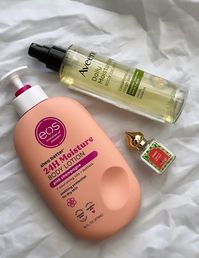 eos pink champagne lotion, aveeno body oil & nemat amber perdume oil