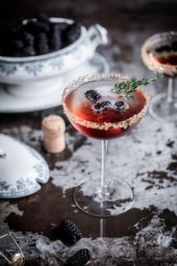 A simple blackberry & thyme champagne cocktail, a simply delightful way to start any evening! | Anisa Sabet | The Macadames | Food Styling | Food Photography | Props | Moody | Food Blogger | Recipes