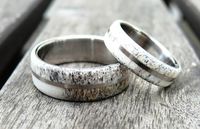 Titanium and Deer Antler Wedding Band Set, Wedding Ring, Titanium Ring, Bone Ring, Deer Antler Ring, with Engraving by RingWithHeart on Etsy https://www.etsy.com/listing/472234505/titanium-and-deer-antler-wedding-band