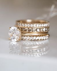 BOLD and beautiful represents this stack! Our Parlor Palm engagement ring is eye-catching with the Petite Domino Marquise, the Small Pea Pod with white diamonds and the Large Pea Pod with gray diamonds. Would you wear this stunner?!