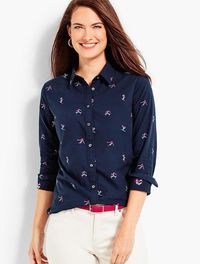 The Classic Cotton Shirt - Skiers Oxford Cloth in indigo blue and hot pink | A basic button-down blouse with a fun, season-right design. Using a unique clip jacquard technique, we decorated this shirt with whimsical skiers and gave it a soft, clean-finished front. Comfortable, fun and super easy to layer, it's perfect under a sweater. Festive Christmas and holiday novelty top | affiliate link | Talbots