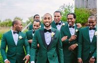 Emerald green groomsmen suits                                                                                                                                                                                 More