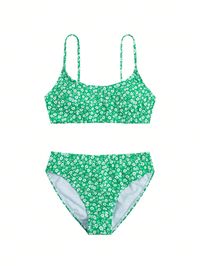 Revamp your beach look with this Floral Print Bikini Swimsuit! Featuring a cute and ditsy floral pattern, this stunning swimsuit showcases a criss cross design and high stretch fabric for a comfortable and flattering fit. The wireless bra and removable padding ensure maximum comfort and support, while the spaghetti straps add a touch of femininity. Made with lined 82% polyester and 18% elastane material, this bikini is perfect for both swimming and lounging. Don't forget to machine wash it for easy and effortless maintenance. Order now and feel confident and stylish on your next beach trip! Size US Bust Top Length Underbust XS 2 27.6 7.5/4.1 24.4-34.6 S 4 29.1 7.9/4.5 26-36.2 M 6 30.7 8.3/4.9 27.6-37.8 L 8/10 32.7 8.7/5.3 29.5-39.8 XL 12 34.6 9.1/5.7 31.5-41.7 Ships in 4-6 daysJoin our mai