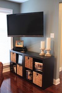 Living Room. Love the shelving under the TV. great for our teeny tiny Living room