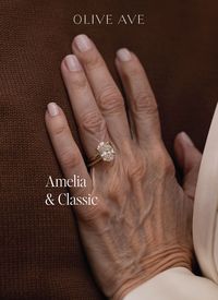 14K Yellow Gold | Amelia features a classic oval shaped center stone set in a traditional solitaire setting on a half round shank. Classic features an elegant assortment of round stones on a half eternity shank. Offered in a variety of stone and setting styles.