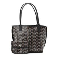 This is an authentic GOYARD Goyardine Reversible Mini Anjou in Black. This petite, reversible tote is crafted of traditional Goyard chevron monogram on black-coated canvas. The tote features black leather trim and top handles, with a matching interior leather lining and removable pouch. 1406736